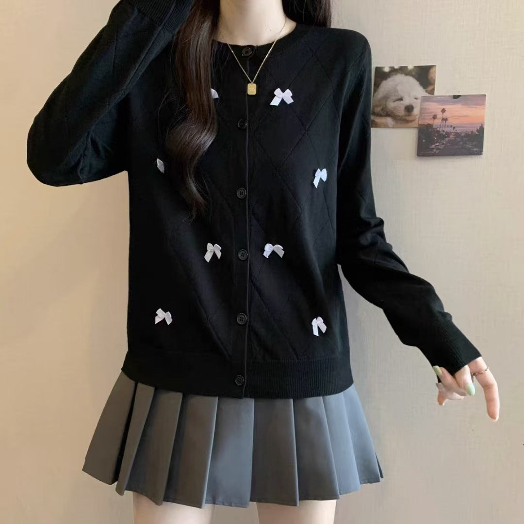 Knitted jacket for women with decorative knots Lune London