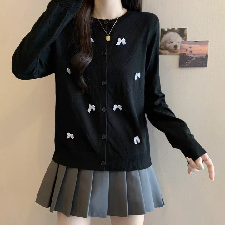 Knitted jacket for women with decorative knots Lune London