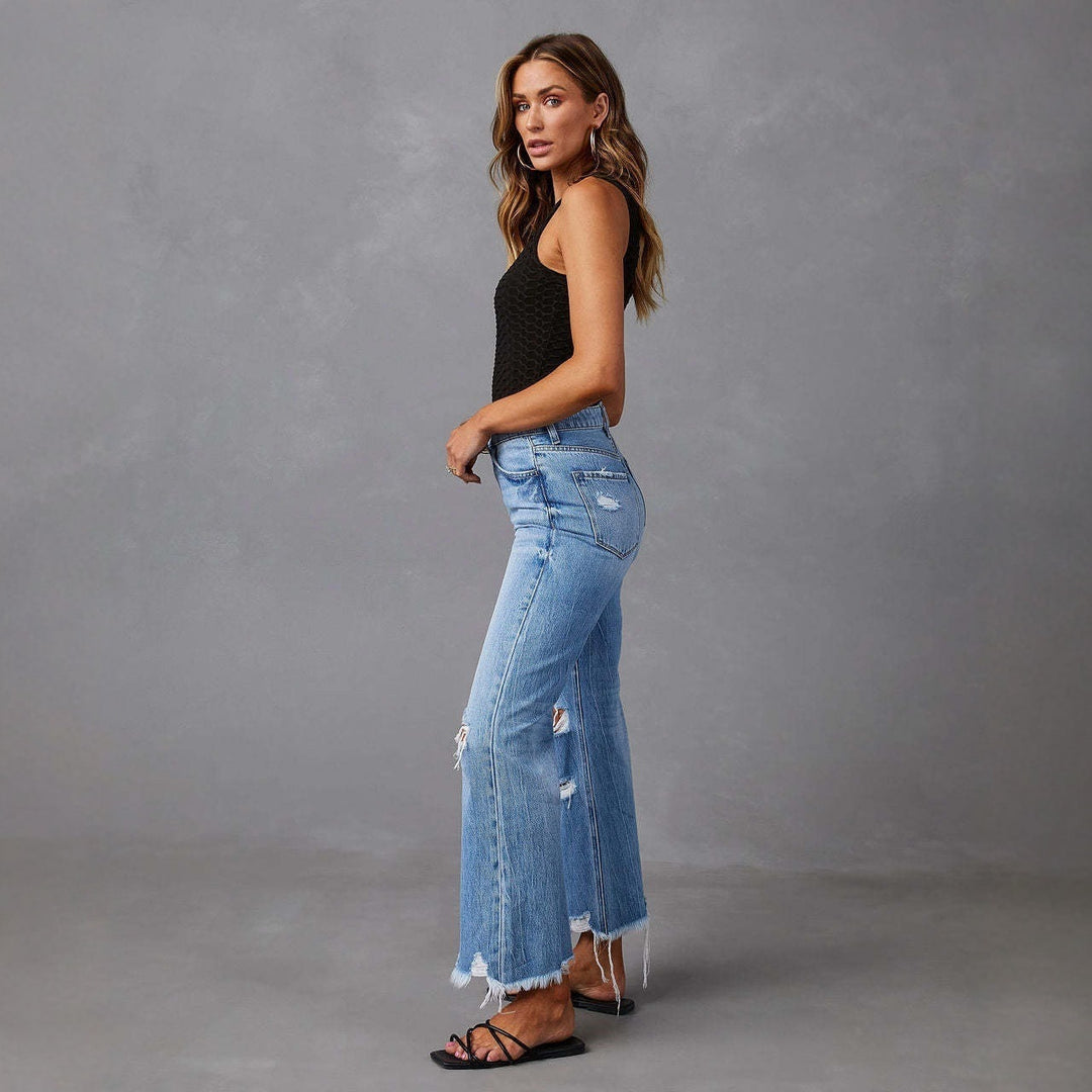 Women's Flared Jeans with Stylish Ripped Details and Frayed Hems Lune London