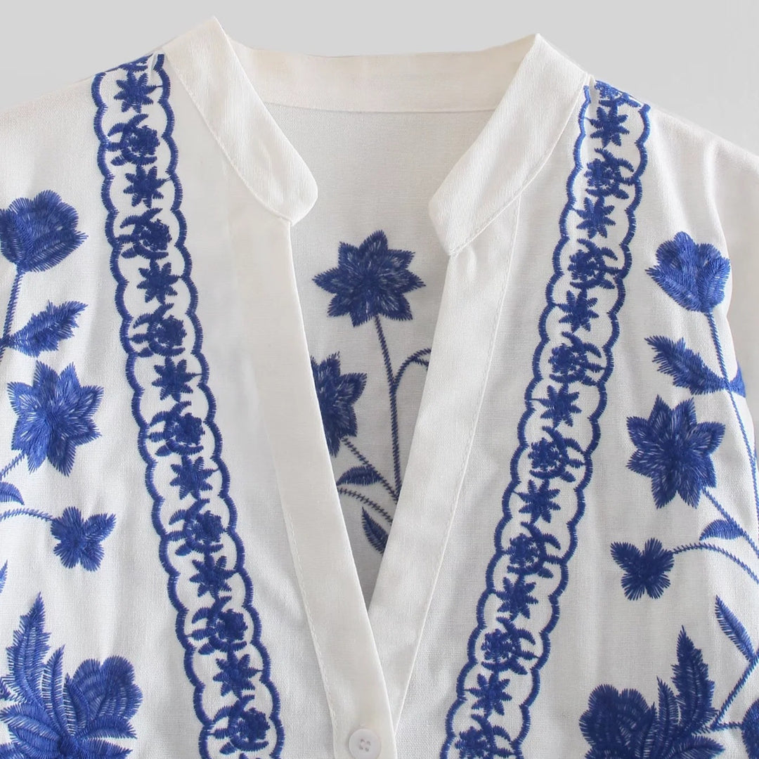 Women's knitted blouse with floral design and button details Lune London