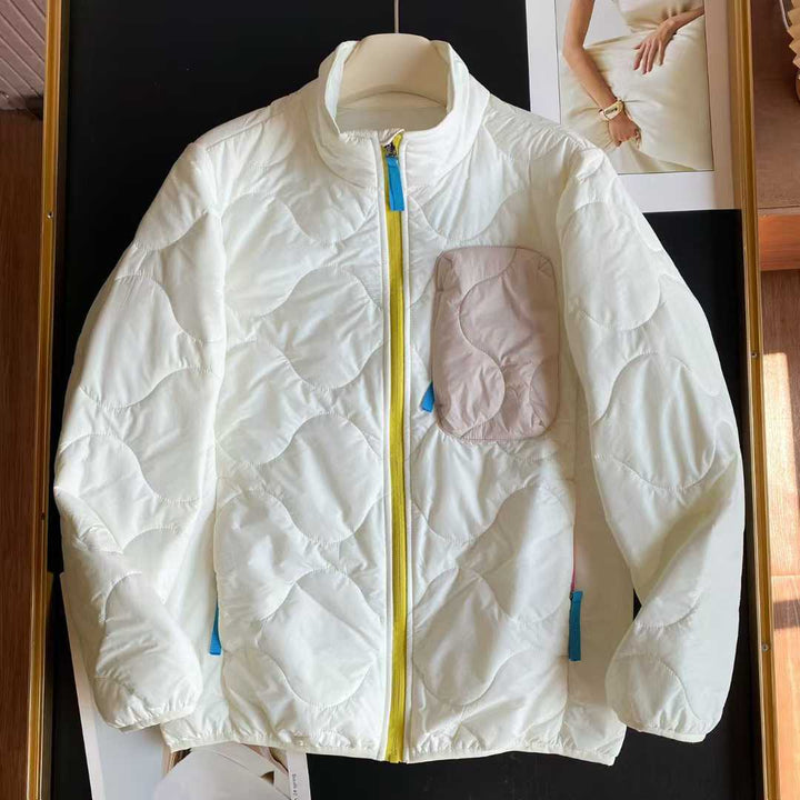 Veste matelassée légère pour femmes avec col haut et poches pratiques Chic & Stil