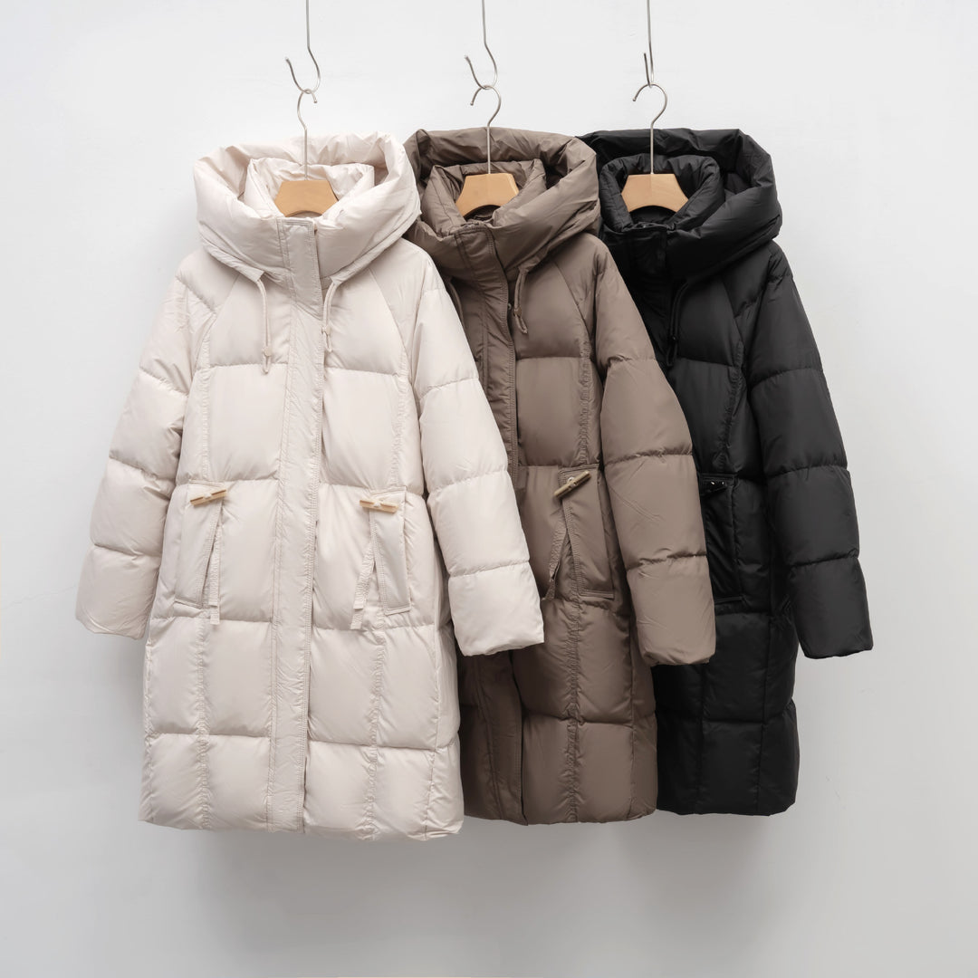 Women's insulated winter jacket with large hood collar and functional pockets Lune London