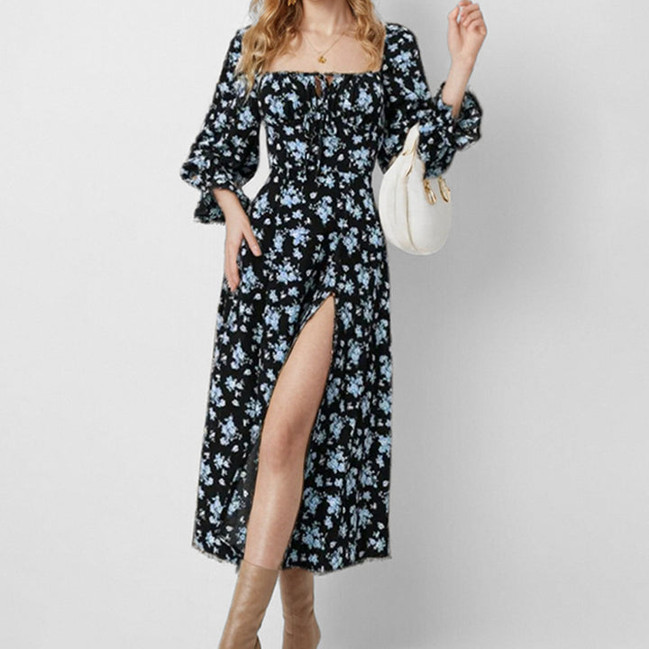 Robe midi pour femmes avec un design floral ludique et une fente haute Chic & Stil