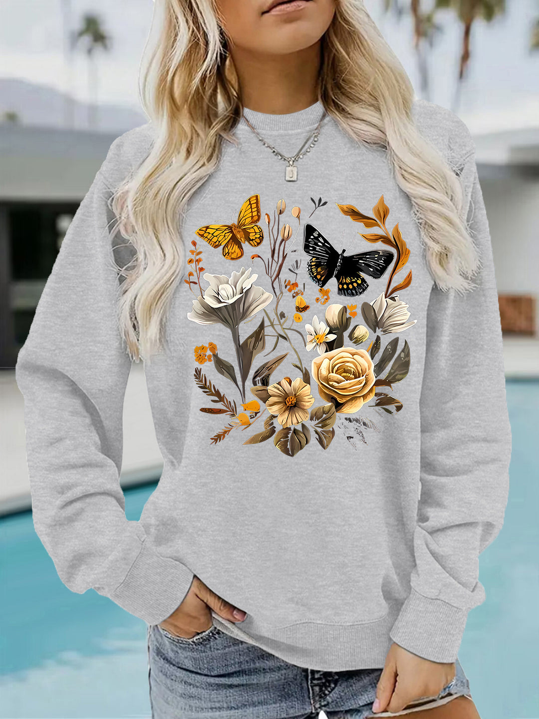 Sweat-shirt femme avec imprimé floral et coupe décontractée Chic & Stil