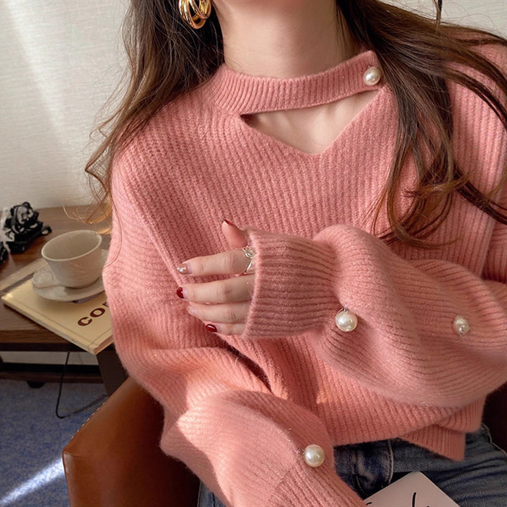 Pull en tricot pour femmes avec un look cut-out raffiné et des manches ornées de perles Lune London