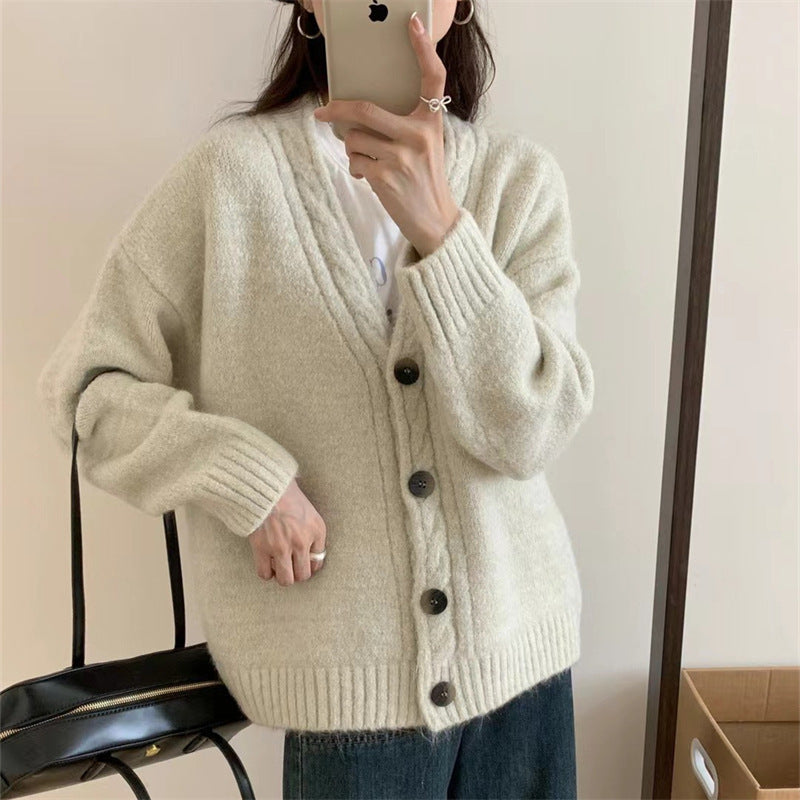 Ladies Comfortable Knit Sweater with an Elegant V Neck and Chic Button Details
