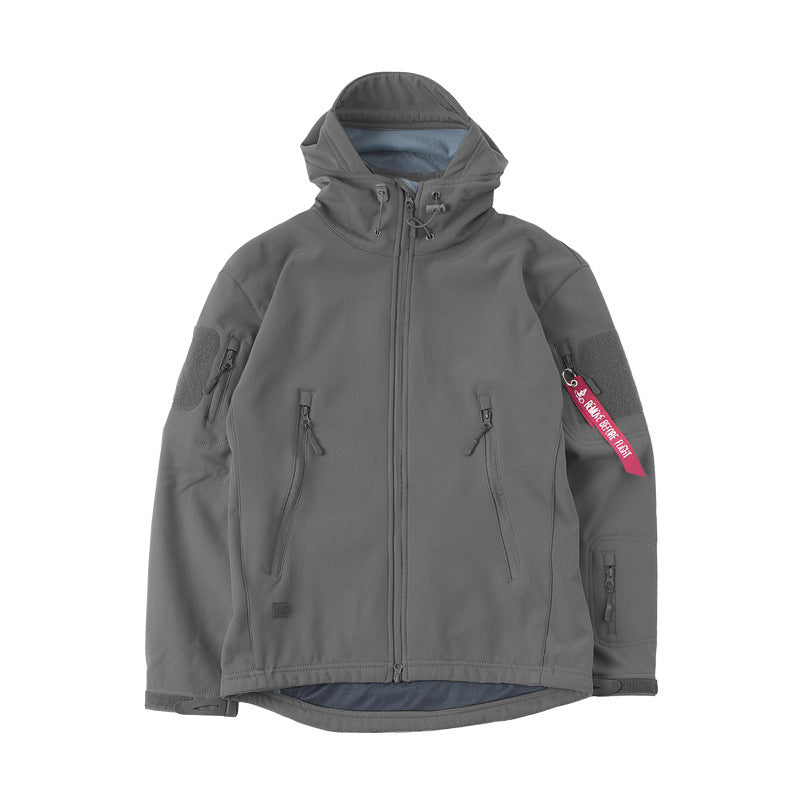 Tactical softshell jacket for men with numerous zipped pockets and an adjustable hood collar Lune London