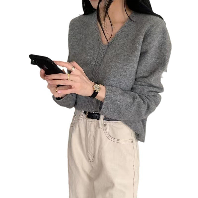 Pull élégant pour femmes en V avec un motif de câble fin Chic & Stil