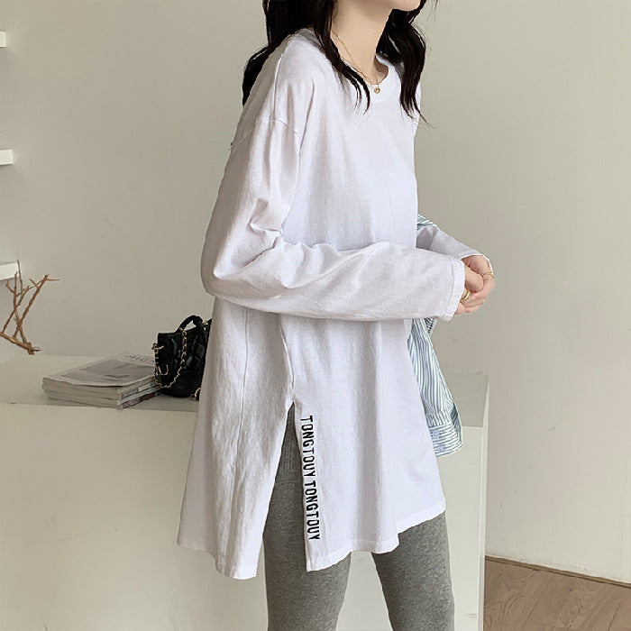 Women's longer oversized shirt with side slits and modern lettering Chic & Stil