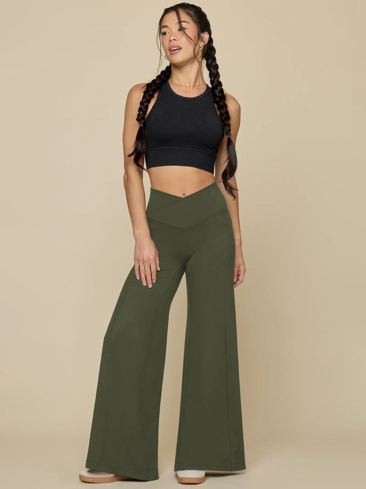 Elegant high-waisted casual trousers for women, with wide legs and practical pockets Lune London