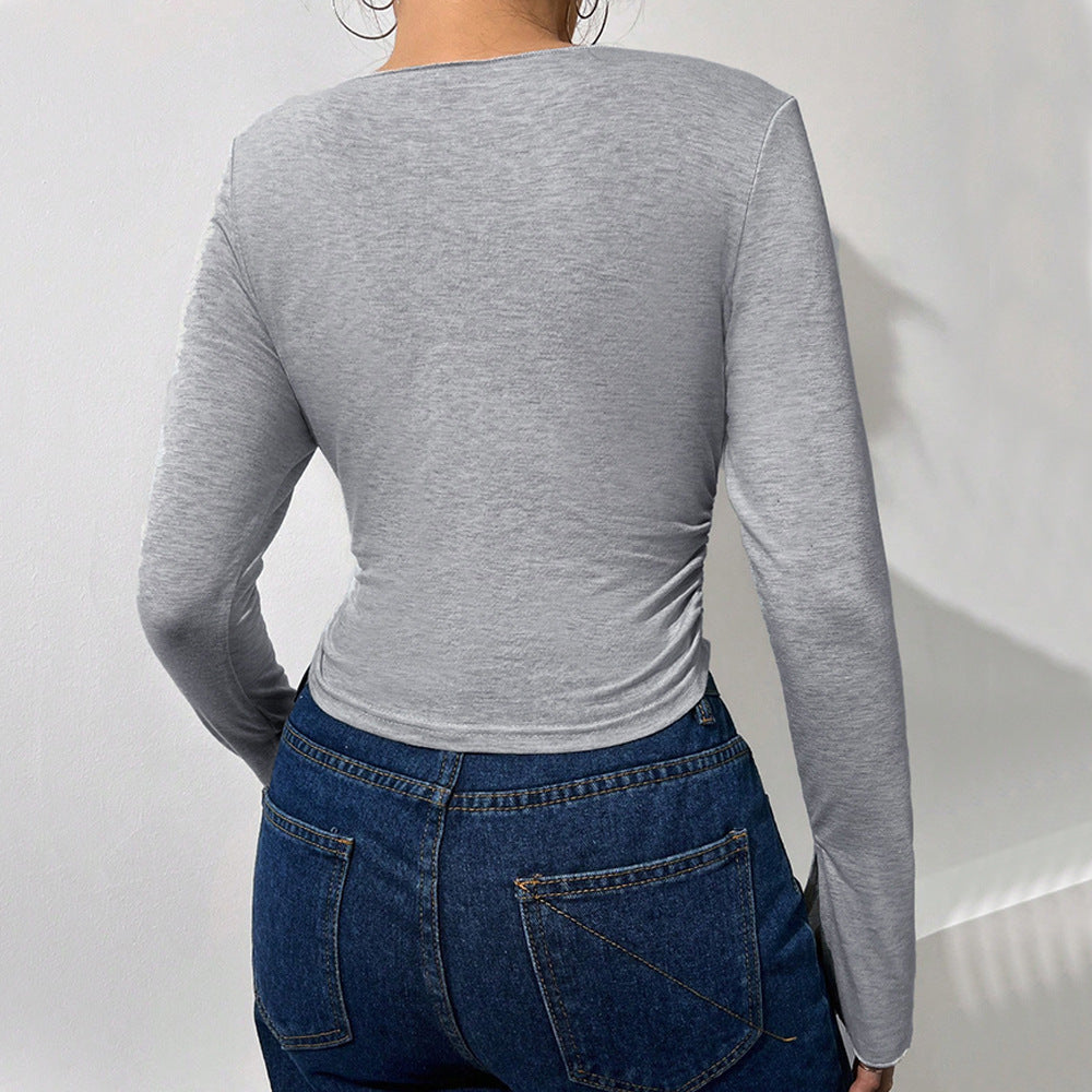 Short women's shirt with trendy bell sleeves and an elegant V neck Chic & Stil