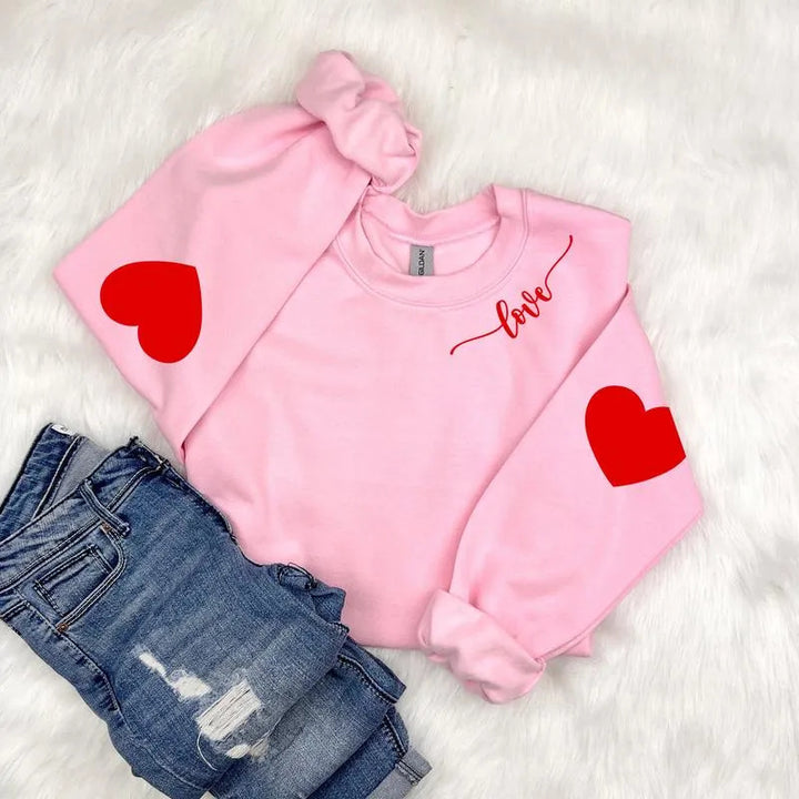 Sweatshirt femme avec design cœur et coupe décontractée Chic & Stil