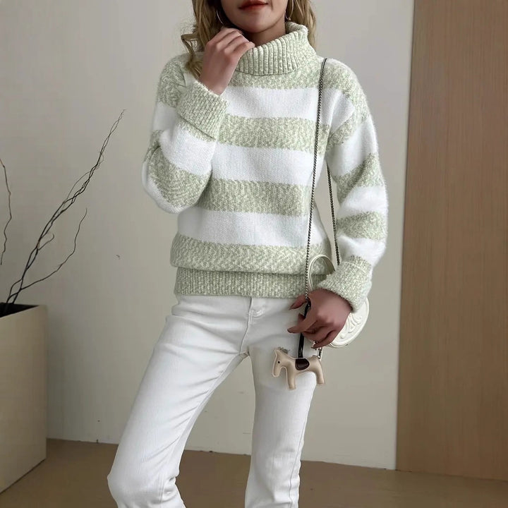 Pull féminin douillet avec col haut et design rayé Chic & Stil