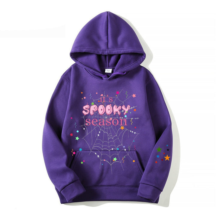 Women cozy hoodie with graphic Halloween design Chic & Stil