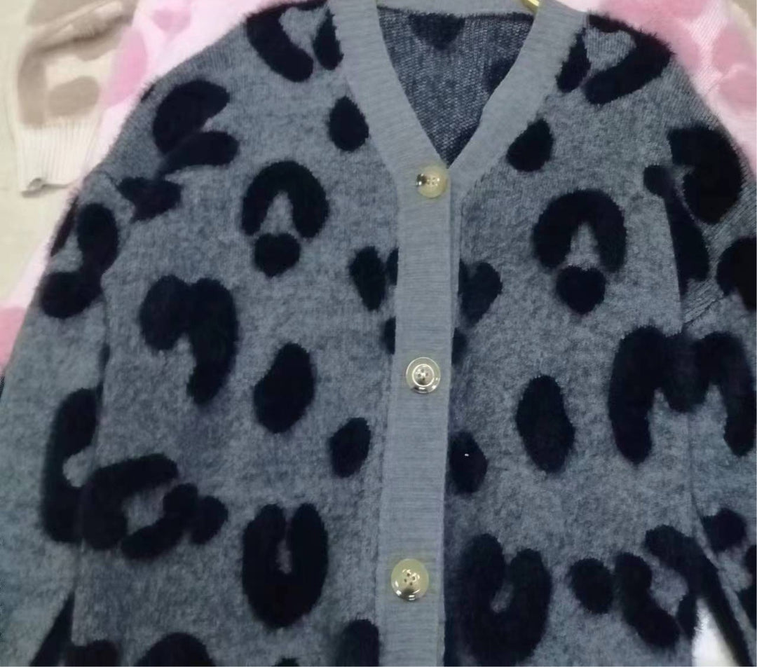 Sweater vest for women in cozy knit with heart shape design and button detail Lune London