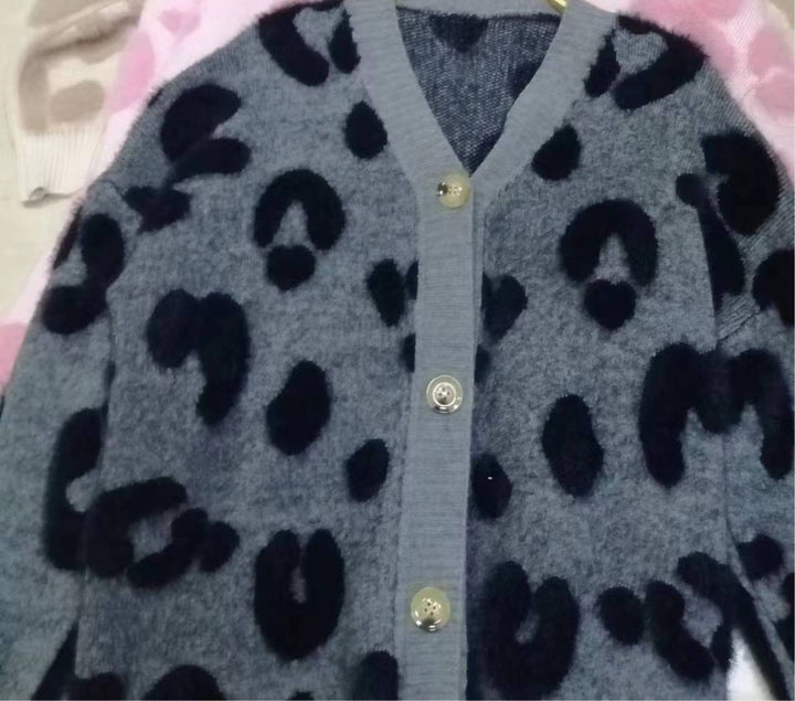 Sweater vest for women in cozy knit with heart shape design and button detail Lune London