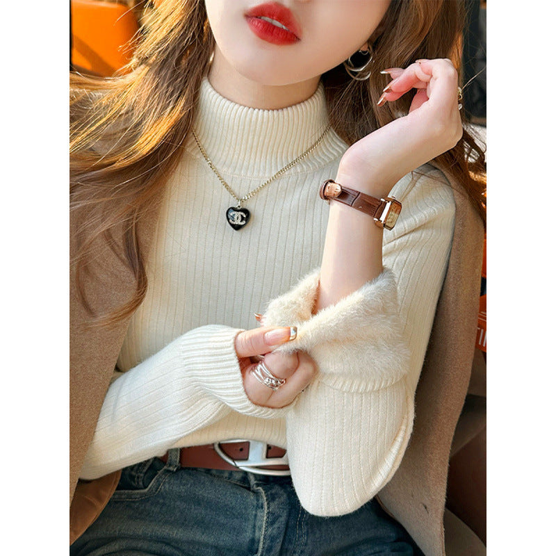 Pull femme avec col roulé et ourlet moelleux luxueux Chic & Stil