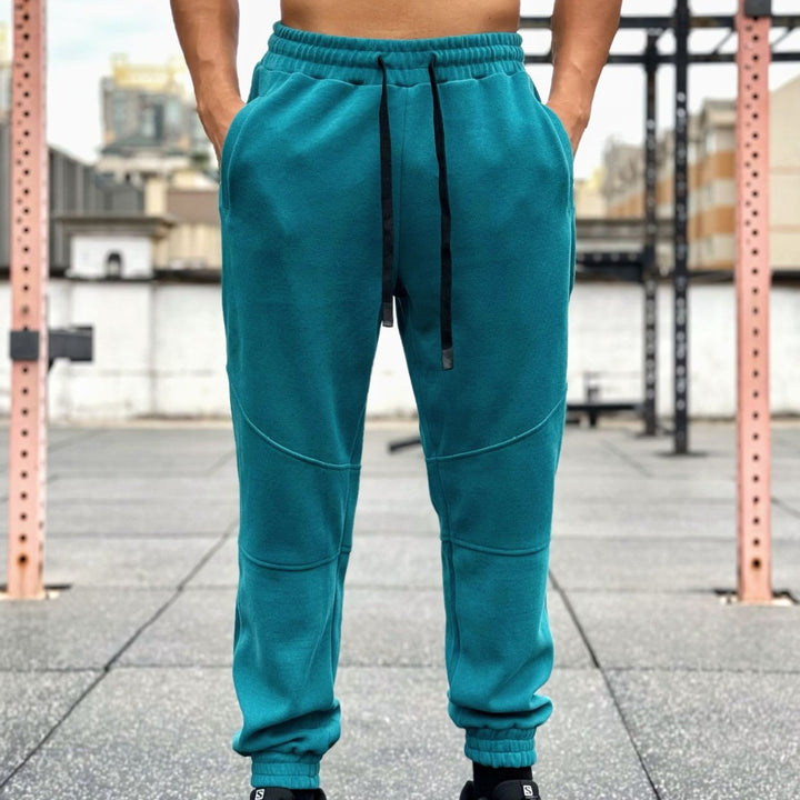 Men's sporty jogging pants with elastic waistband and practical side pockets Lune London