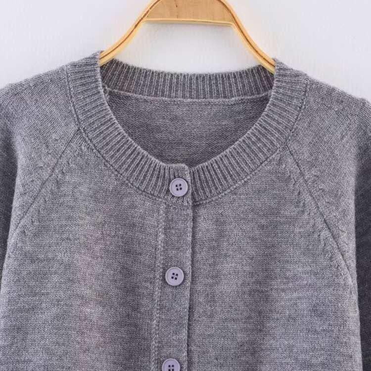 Cropped knit jacket for women with button details and elastic waistband Lune London