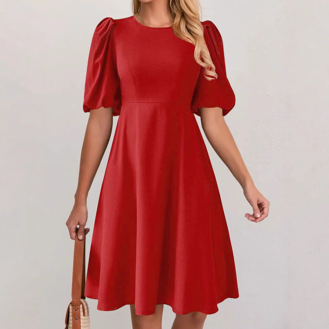 Puff sleeve dress for women with a flowing cut and waist accentuation Lune London