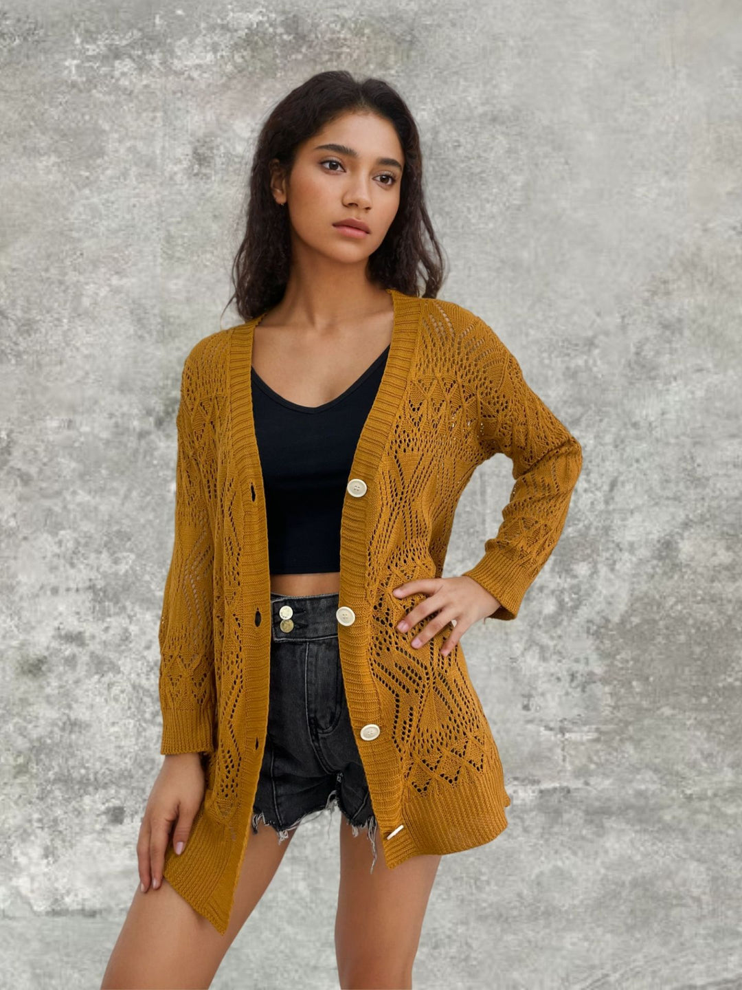 Knitted jacket for women with perforated pattern and button closure Lune Londonl