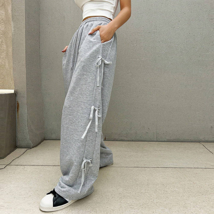 Pantalons décontractés pour femmes avec détails de volants sur les côtés et taille élastique Chic & Stil