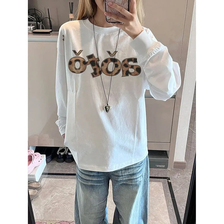 Chemise à manches longues pour femmes avec design graphique créatif Chic & Stil