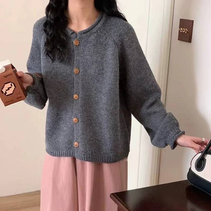 Knitted jacket for women with asymmetrical cut and generous balloon sleeves Lune London