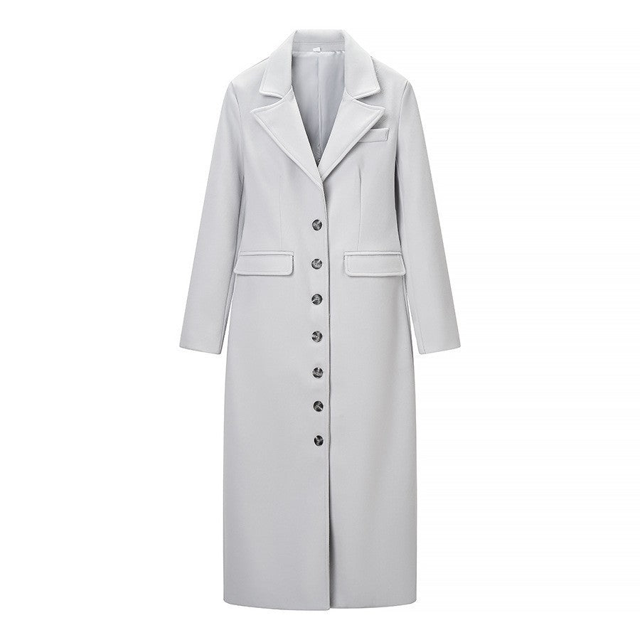 Manteau trench élégant pour femme au design minimaliste avec poches pratiques Chic & Stil