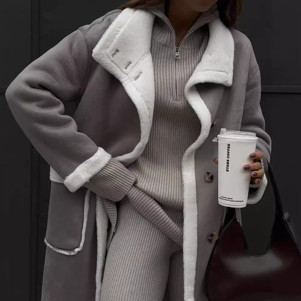 Ladies elegant and warm fleece coat with oversized cut and stylish button placket