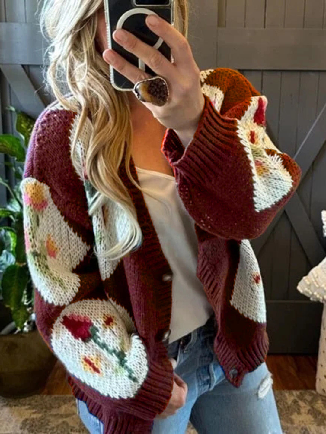 Women's knit jacket with floral pattern and decorative button design Lune London