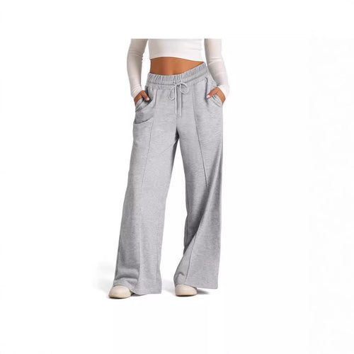 Leisure pants for women in a loose fit with an elastic waistband and practical entry pockets Lune London