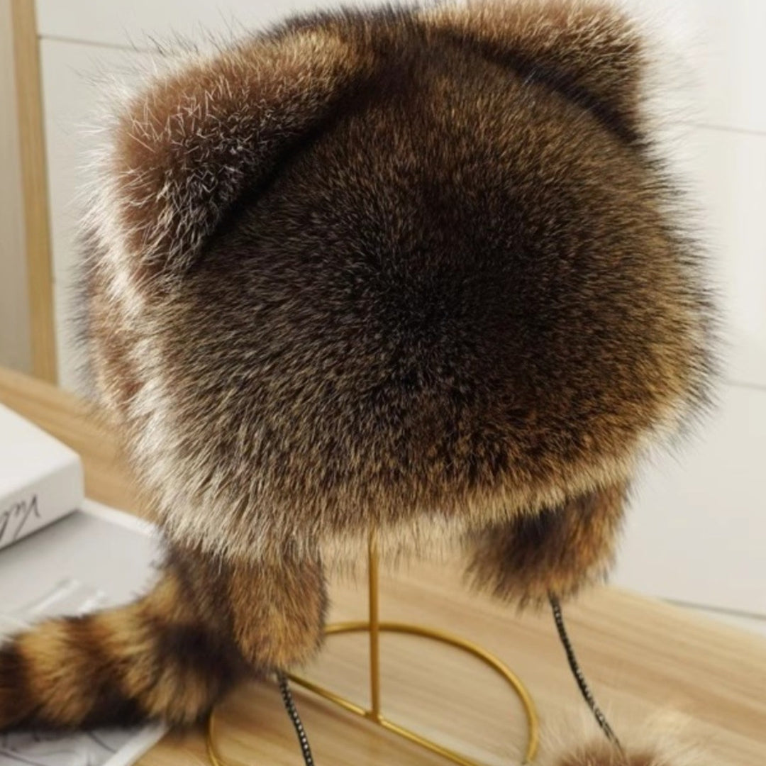 Ladies fashionable fur cap with ear protection and pom-poms Lune London