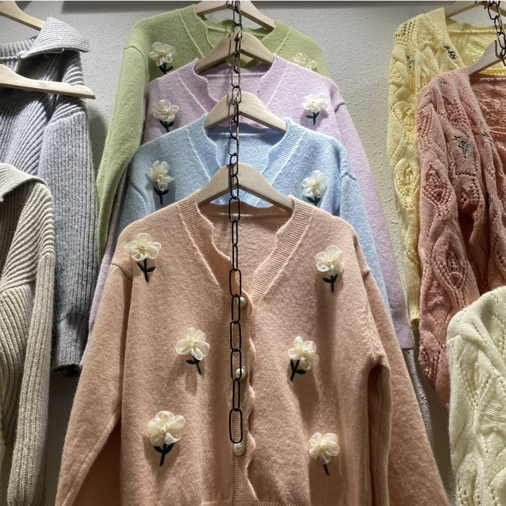Playful women's cardigan button with floral embroidery and pearl buttons Lune London