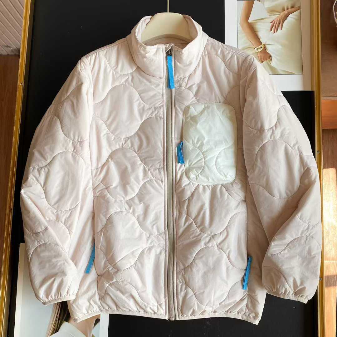 Veste matelassée légère pour femmes avec col haut et poches pratiques Chic & Stil