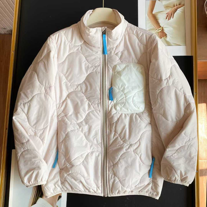 Veste matelassée légère pour femmes avec col haut et poches pratiques Chic & Stil