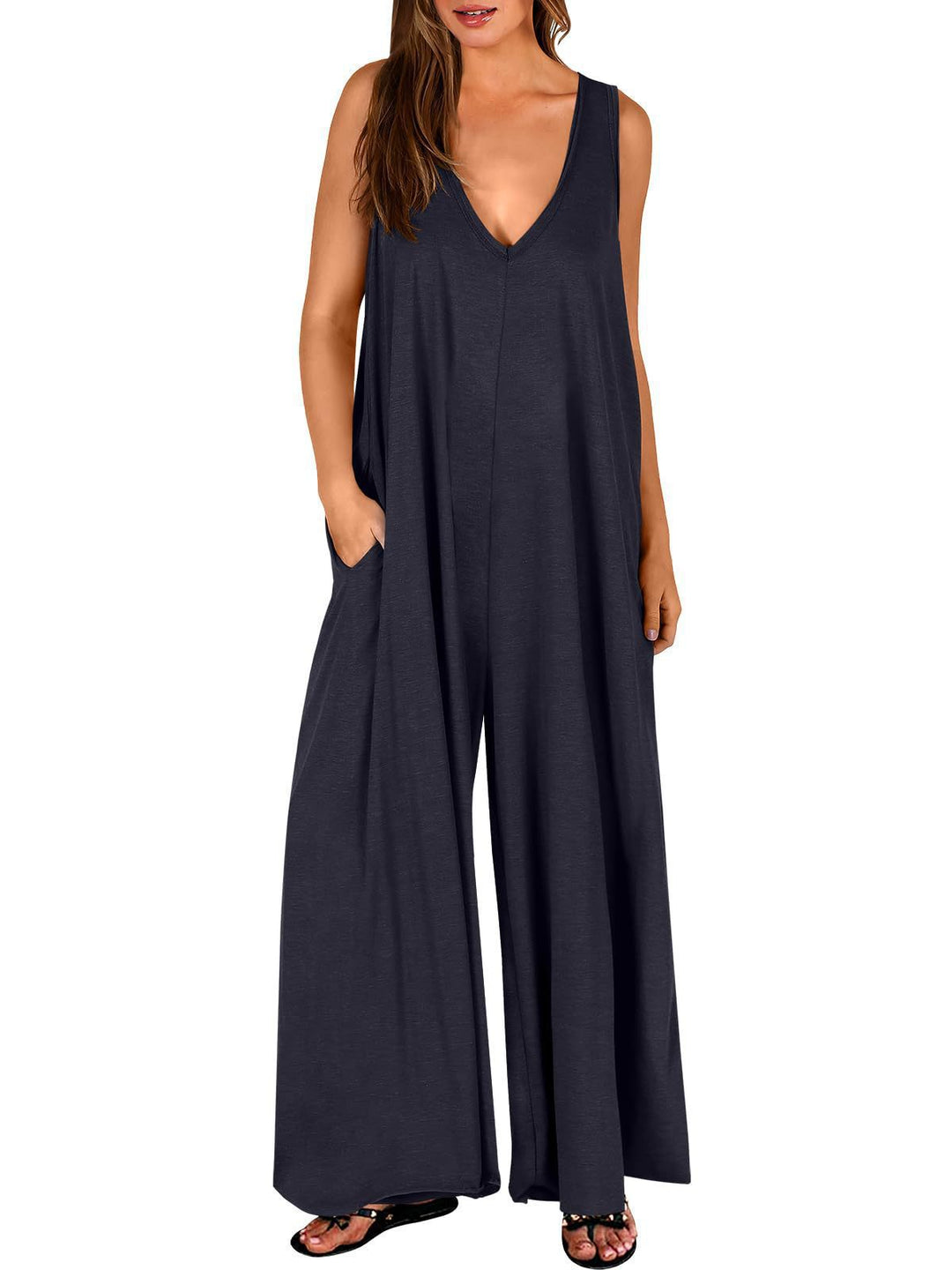 Ladies lightweight jumpsuit with deep V-neck and side pockets Lune London