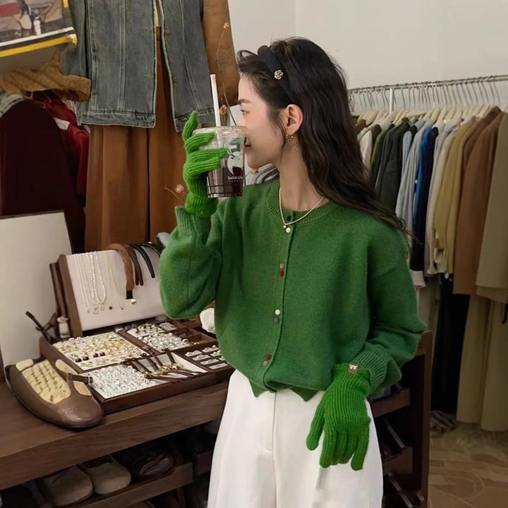 Knitted jacket for women with decorative button accents and soft material Lune London
