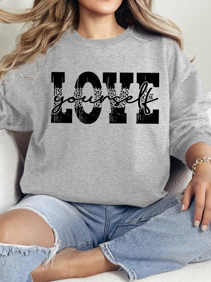 Sweat-shirt pour femmes avec une lettrage LOVE créatif et une coupe décontractée Chic & Stil