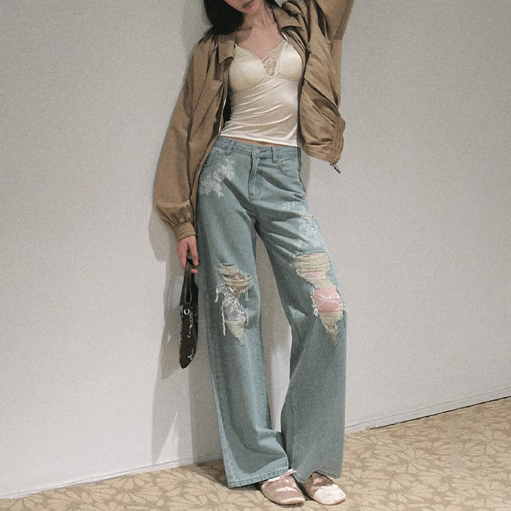 Women's wide cut jeans with individual destroyed details and floral print Lune London