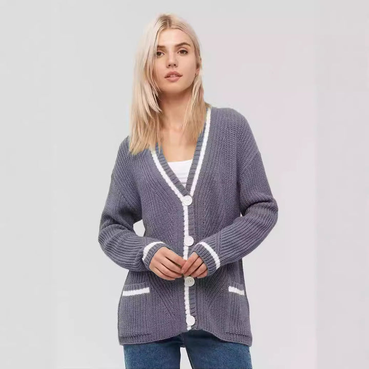 Ladies chunky knitted jacket with practical flap pockets and contrasting details Lune London