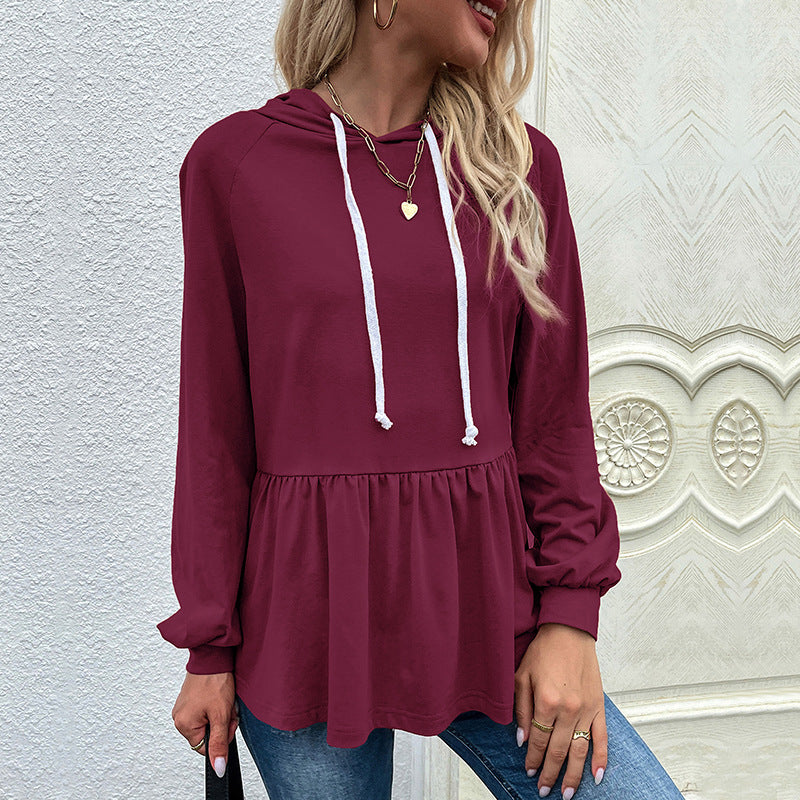 Casual hooded blouse for women with asymmetric cut and ruffle details Lune London