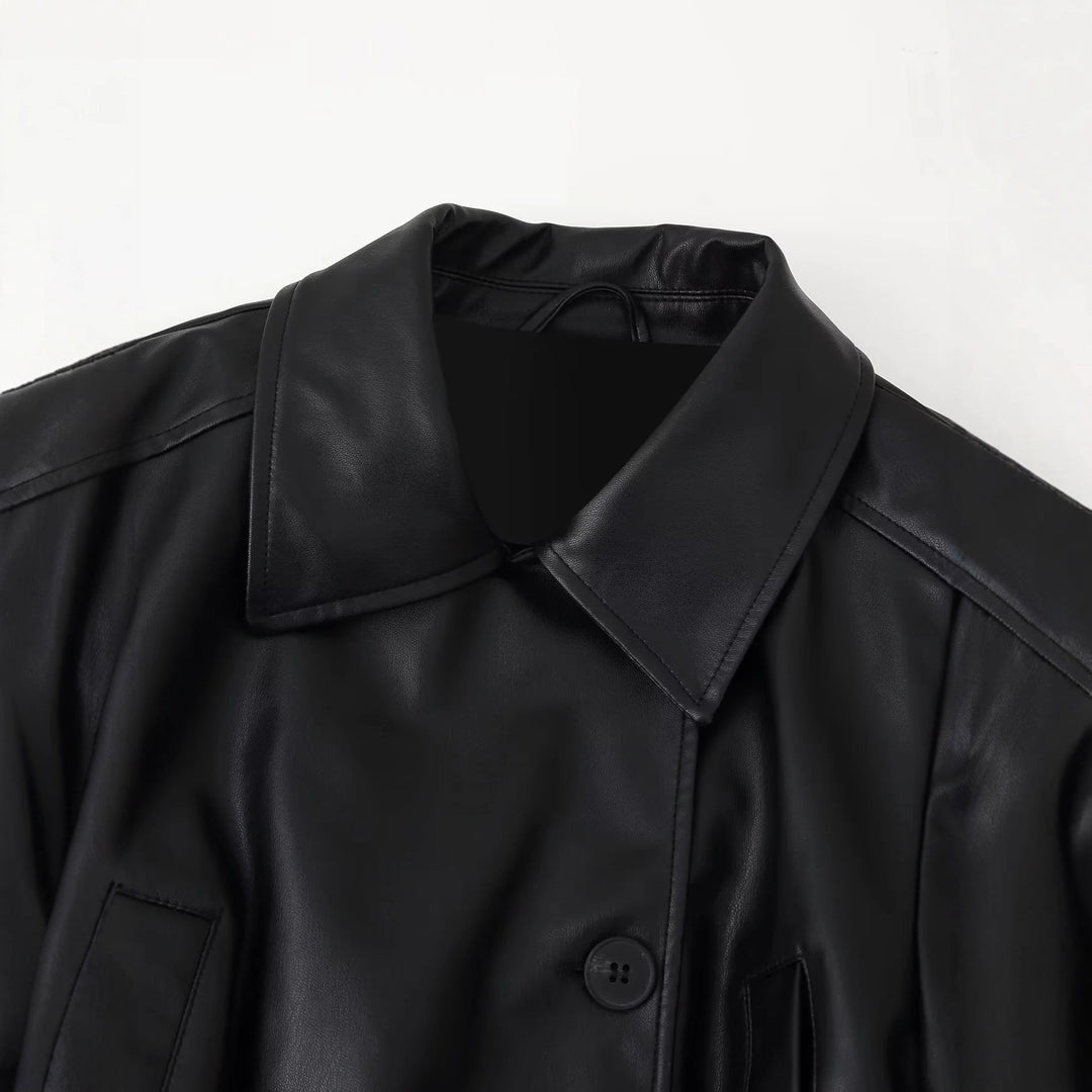Faux leather jacket for women with elegant button details and a chic belt design