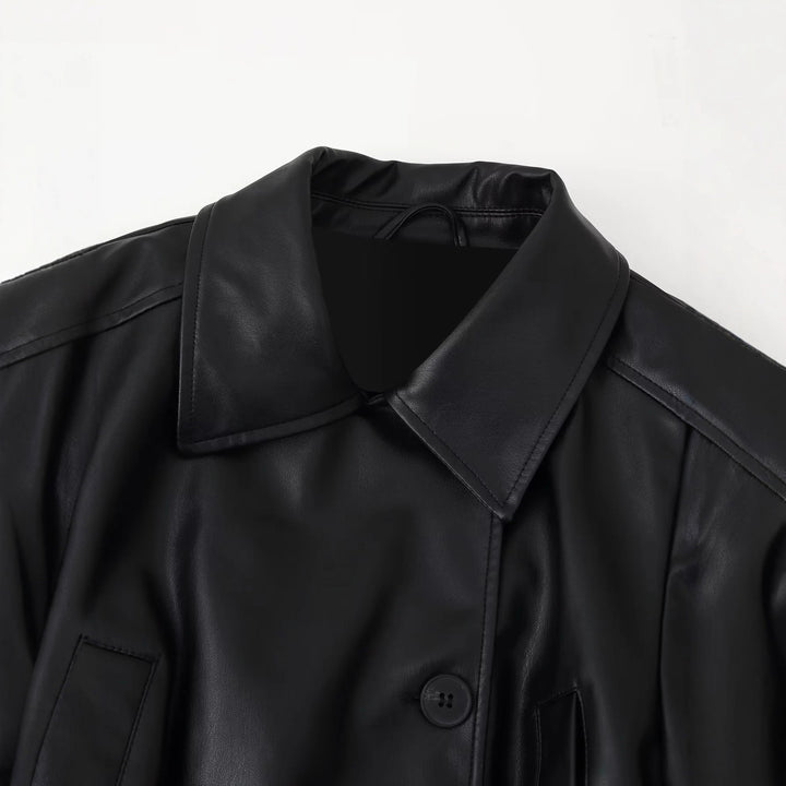 Faux leather jacket for women with elegant button details and a chic belt design
