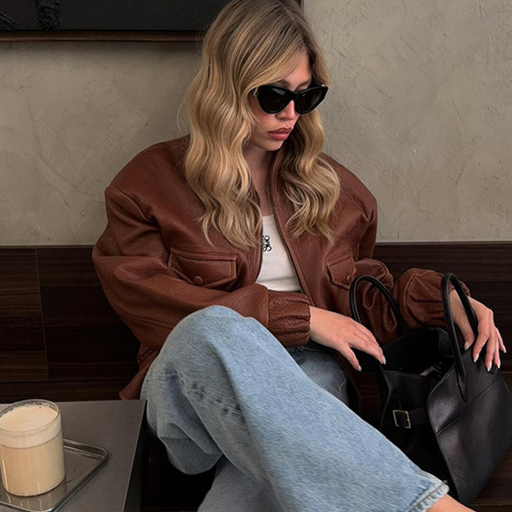 Fashionable synthetic leather jacket for women with unique pockets and elastic ribbed edge finishes Lune London