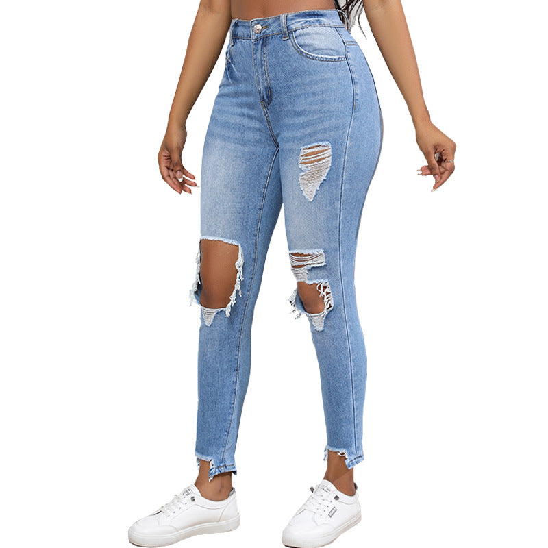 High-waisted women's jeans with ripped and fringed details Lune London