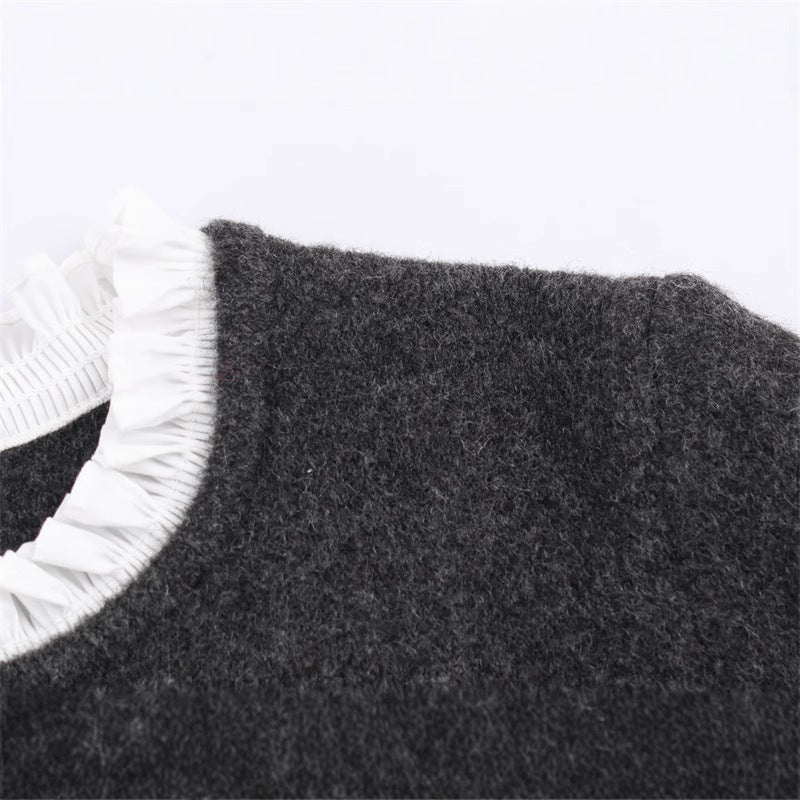 Knitted jacket with ruffle details and button closure for women Lune London