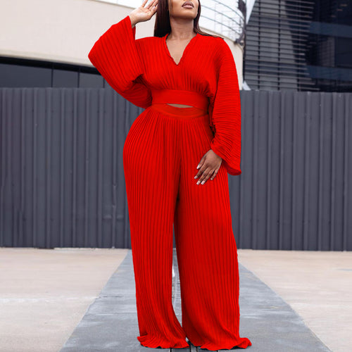 Puffed sleeve pleated jumpsuit for women with a fitted silhouette Lune London