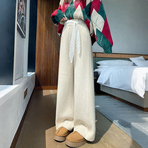 Pantalons larges taille haute pour femmes avec des détails de laçage décoratifs Chic & Stil