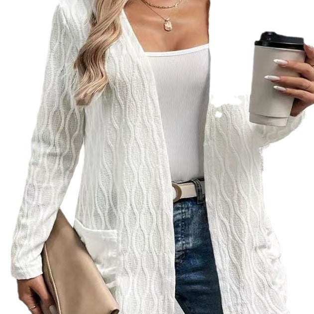 Women's knitted jacket with a refined wave pattern and practical pockets Lune London